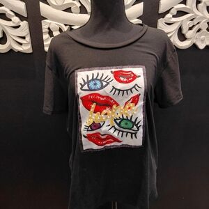 Black Graphic Tee with Colorful Eye & Lip Patch